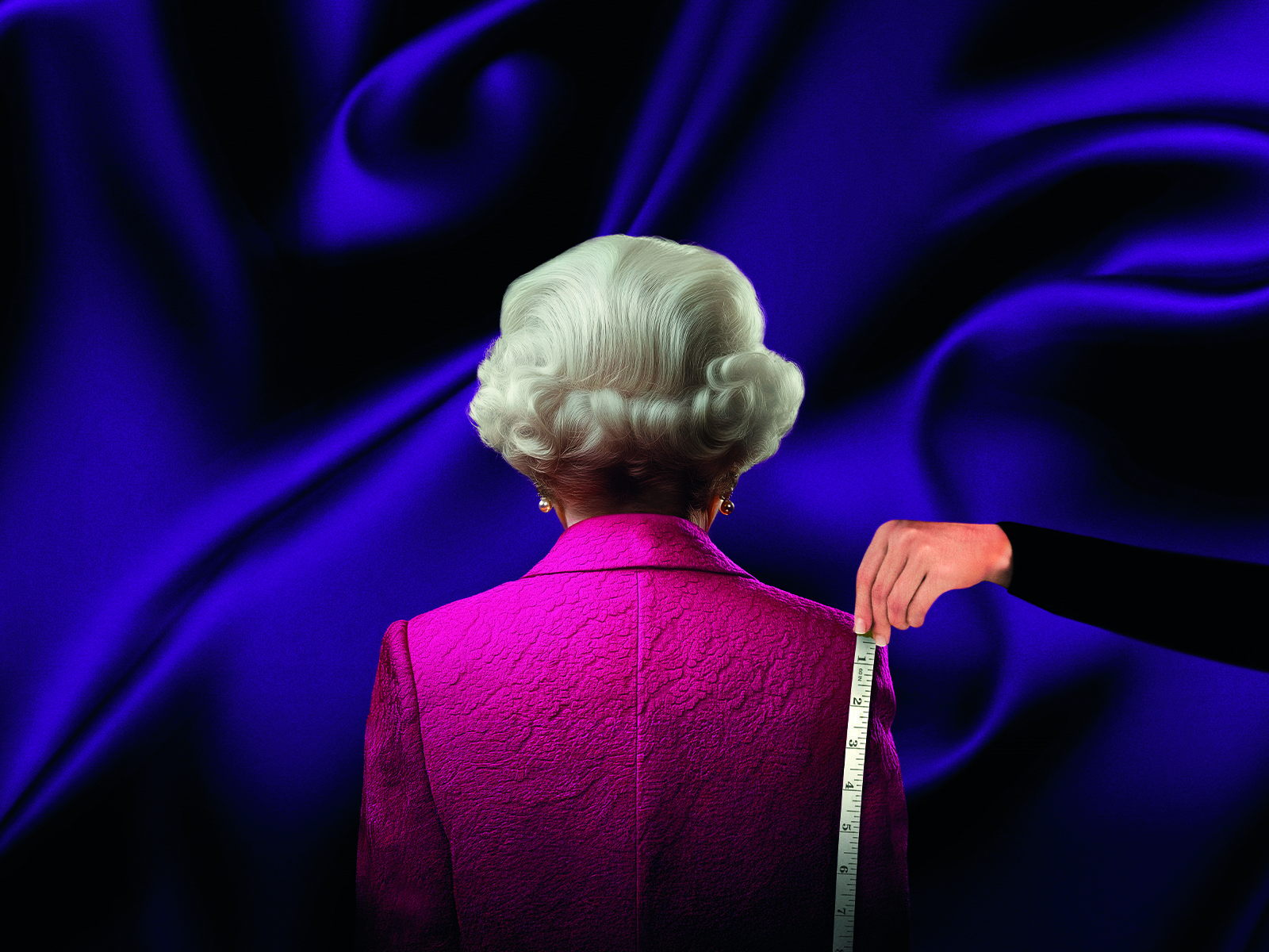 The Queen stands in a pink jacket whilst someone measures her with a measuring tape