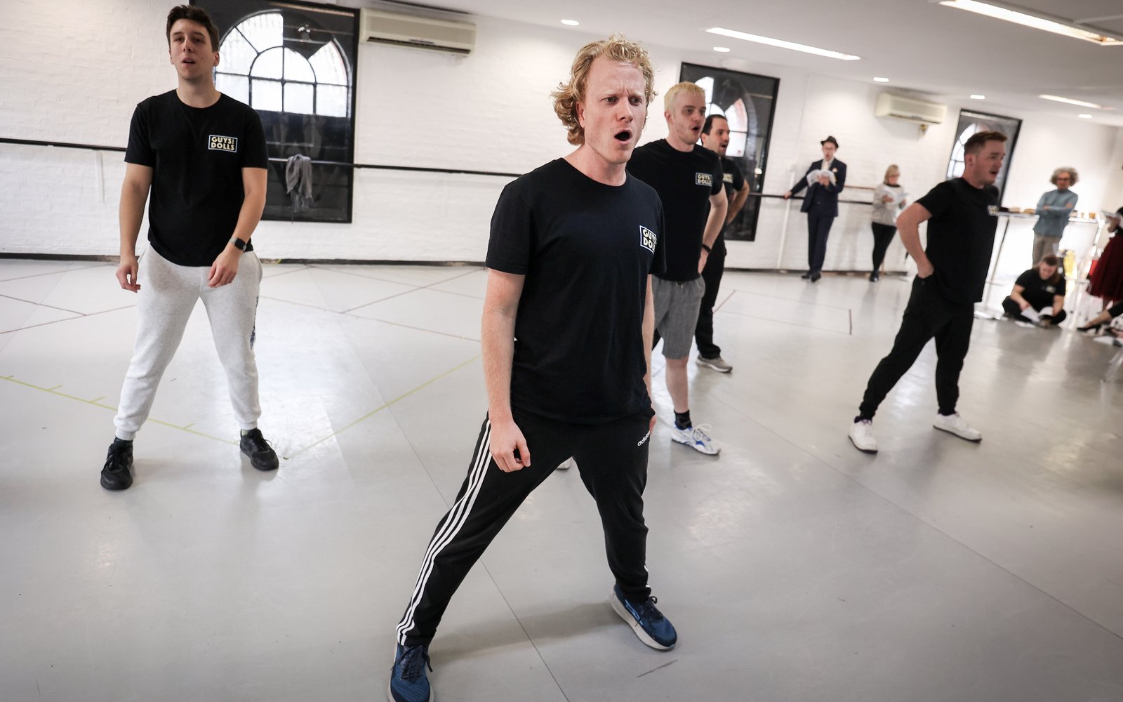 The cast of Guys & Dolls in rehearsal