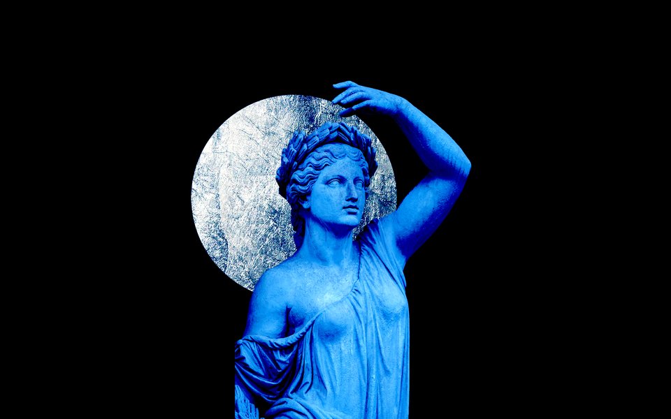 A blue marble statue of a woman raising her arm to her head, there is a large silver moon behind her