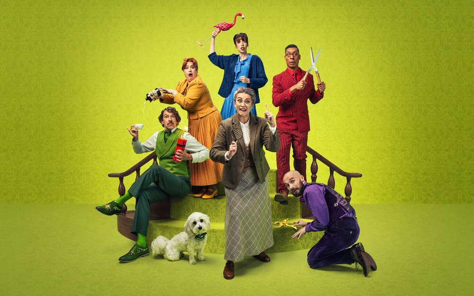 A group of murder mystery characters holding comedy murder weapons