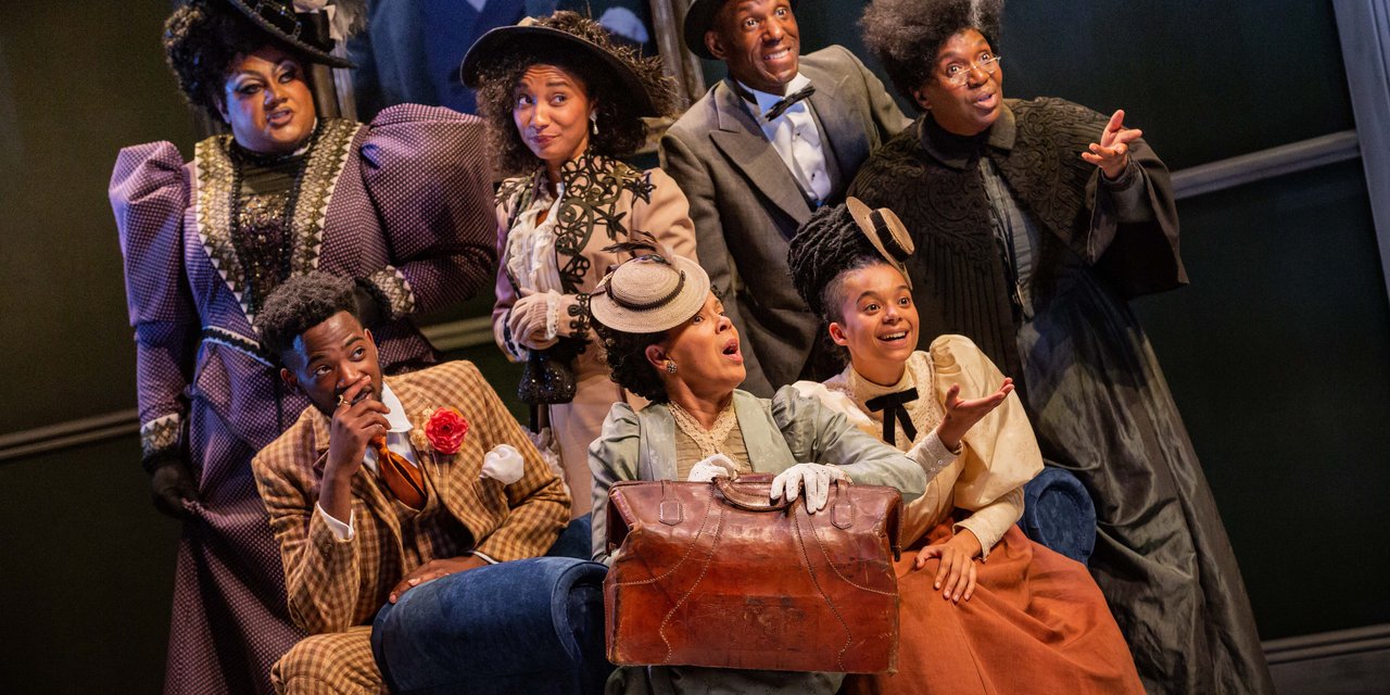 A group of people in grand regency costume, they look shocked and excited. One of them is holding a large handbag